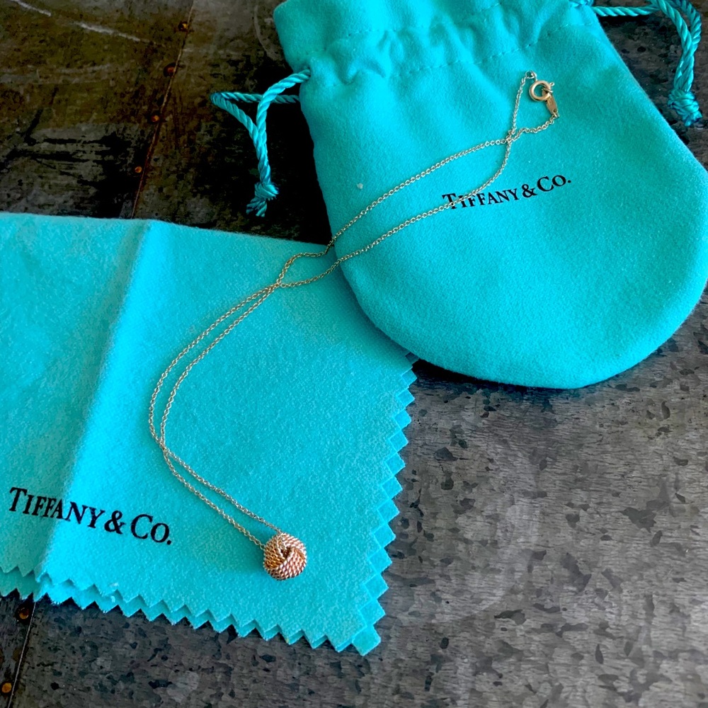 Tiffany & Co. Twist knot necklace pendant.